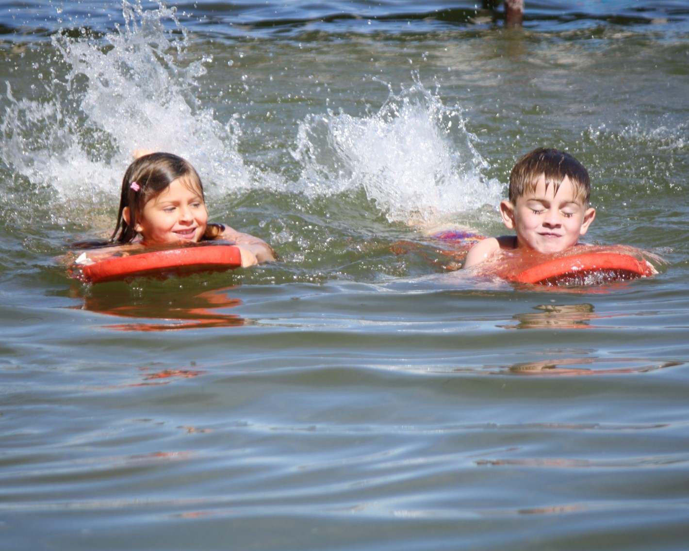 Picture of two kids swimming